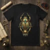 Detailed Egyptian Scarab Beetle design with gold and turquoise accents on a black t-shirt, featuring ancient hieroglyphs in the background