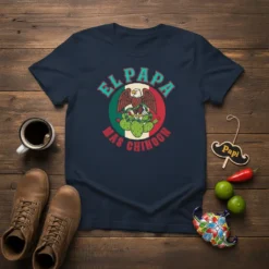 El Papa Mas Chingon t-shirt with Mexican eagle, cactus, and flag colors. Bold text design for fathers