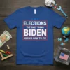 Blue t-shirt with bold white text: "ELECTIONS THE ONLY THING BIDEN KNOWS HOW TO FIX" with red border and blue