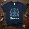 T-shirt with the word "Embrace" and a colorful graphic of a woman in a yoga pose surrounded by lotus flowers