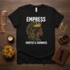 Empress Rooted & Crowned text with a regal Black woman profile wearing a crown on a black t-shirt