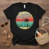 Endless Summer t-shirt with retro sunset, surfboard, and palm tree graphic