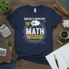 Navy blue t-shirt with bold white text: "ENGLISH IS IMPORTANT BUT MATH IS IMPORTANTTER" surrounded by math formulas and gear