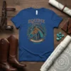 Equine Spirit Strength & Grace text with a horse head illustration, framed by ornate patterns on a blue t-shirt