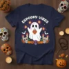 Espooky Vibes text with a cute ghost, sugar skulls, pumpkins, and lanterns graphic on a navy blue t-shirt