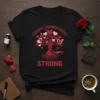 Black t-shirt with red text "ESSENTIAL THROMBOCYTHEMIA STRONG" and a tree with red and pink hearts, symbolizing ET awareness