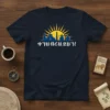 T-shirt with white text "እኔ ኢትዮጵያዊ ነኝ!" above Ethiopian cityscape silhouette and sun graphic, navy blue shirt