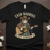 Even Baddies Get Saddies text with a cowboy cat playing guitar on a black t-shirt, country music theme