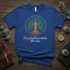 Christian t-shirt with "Every breathe proclaims His name" text and a Tree of Life design, featuring the word JESUS on