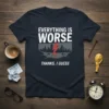 Everything is Worse Thanks I Guess sarcastic quote t-shirt with a dystopian city graphic and lightning bolt