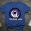 Astronaut sitting on a crescent moon with the text "Everything Sucks" below, on a royal blue t-shirt