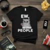 Black t-shirt with white text "EW, PEOPLE" and a cartoon cat wearing sunglasses holding a flower