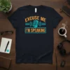 Excuse Me I'm Speaking t-shirt with a retro microphone graphic and bold orange and teal text