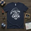 Expect Our Greatest Catch pregnancy announcement t-shirt with fishing rod graphic and baby footprints