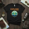 Black t-shirt with "EXPLORE N more" text and a circular compass design featuring mountains, water, and a kayak, ideal for