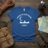 Explore the Silent Waters Journey t-shirt with a graphic of a canoeist paddling under a crescent moon and stars