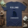 F.E.L.INE COMPANION text and black cat graphic on a navy blue t-shirt