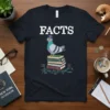 T-shirt with the word "FACTS" above a cartoon pigeon wearing an NYC hat, sitting on a stack of books with
