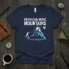 Faith Can Move Mountains quote t-shirt with a graphic of a person pulling a mountain towards the sun