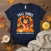 Fall Vibes Cozy Cuddles & Pumpkin Spice text with a cute tabby cat sitting among pumpkins and autumn leaves graphic