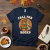 Fall for Books t-shirt design with stacked books, a worm, and a pumpkin, featuring autumn leaves and cozy theme
