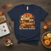 Fall for Jesus He never leaves Christian autumn t-shirt with tree graphic and pumpkins