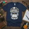 Fantasy Football Commish Est. 2024 text with football helmet and open book graphic on a navy t-shirt