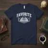 Navy blue t-shirt with white text "FAVORITE" above an open book graphic