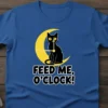 Feed Me, O'Clock! humorous quote t-shirt with a black cat on a crescent moon graphic