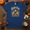 Feelin' Cute Might Curse You Later witch design with cauldron, black cats, and pumpkins on a navy t-shirt