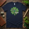 Navy t-shirt with "Feeling Lucky" text inside a green and gold Celtic shamrock design