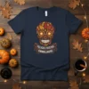 Felices Fiestas Embrujadas T-Shirt with a colorful skull design made of fall leaves, navy blue shirt