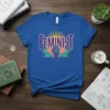 Blue t-shirt with the word "Feminist" in purple and white, above a raised fist graphic with a sun and colorful