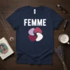 Navy blue t-shirt with white "FEMME" text above a circular graphic of four interlocking colored shapes