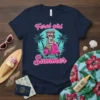 Feral Girl Summer t-shirt design with a raccoon riding a pink scooter, palm trees, and waves