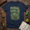 Feral Goblin t-shirt design featuring a green goblin character with glowing eyes surrounded by mushrooms and vines