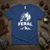 Feral Wolf Mountain Spirit T-Shirt with a howling wolf graphic and mountain silhouette