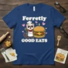 Ferretly GOOD EATS t-shirt featuring a cartoon chef ferret next to a large burger, with hearts and text