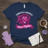 Navy blue t-shirt with "Fibromyalgia Awareness Fibro Fighter" text, pink ribbon, and a pink lion graphic