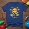 T-shirt with "FIELD DAY Vibes" text and a smiling sun graphic wearing heart sunglasses, surrounded by school and sports elements