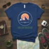 Find Love In Nature t-shirt design featuring mountains, sun, compass, and heart graphic