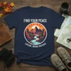 Find Your Peace Explore Dream Discover t-shirt with a mountain stream and sunset graphic