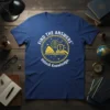 Blue t-shirt with "FIND THE ANSWERS Unlock Knowledge" graphic featuring a brain, book, and magnifying glass