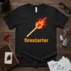 Black t-shirt with the word "firestarter" and a graphic of a lit matchstick, symbolizing ignition and change