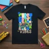 First Grade Vibes text with a cute turtle wearing a graduation cap, surrounded by books and stars on a black