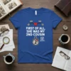 Blue t-shirt with white text "FIRST OF ALL, SHE WAS MY 2ND COUSIN" and family tree graphics