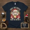 Christmas t-shirt with Santa Claus holding a coffee mug, featuring the text "First The Coffee Then The Ho Ho's"