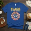 Blue t-shirt with "Flags of the World" text and a circular design of international flags surrounding a world map graphic