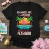 Flamingos Are Awesome I Am A Flamingo text with a crowned flamingo graphic on a black t-shirt