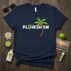 Navy blue t-shirt with white "FLORIDIAN" text and a stylized palm tree graphic, representing Florida